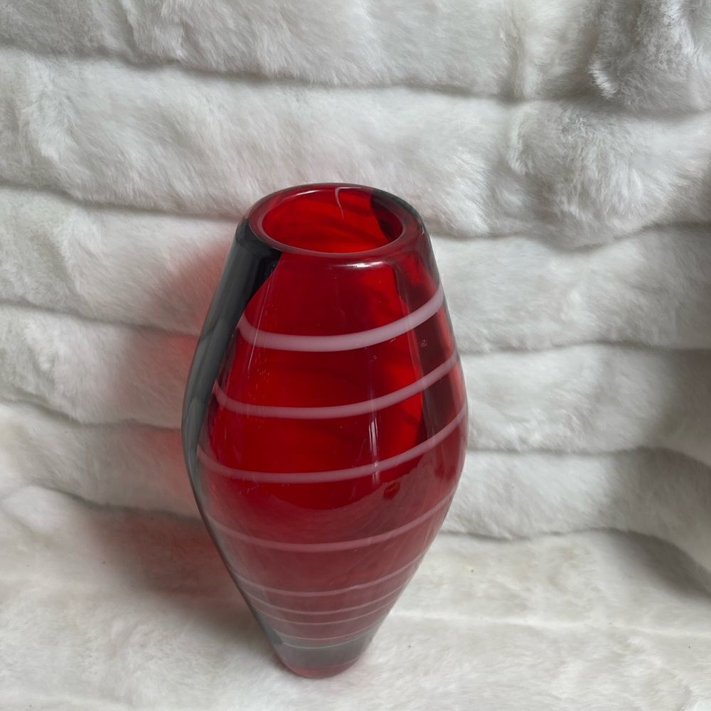 Unbranded.Heavy glass vase red with white stripes and black side straps